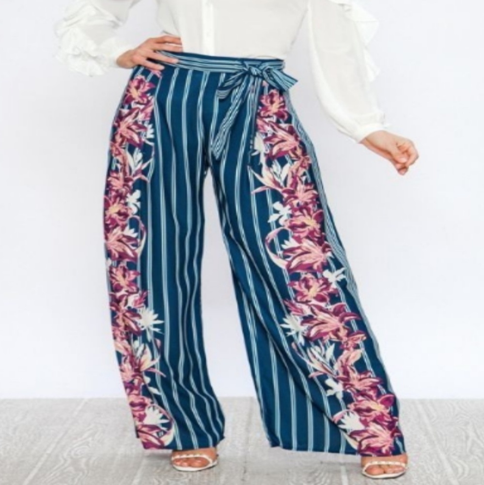 Wide leg floral pants with bow.